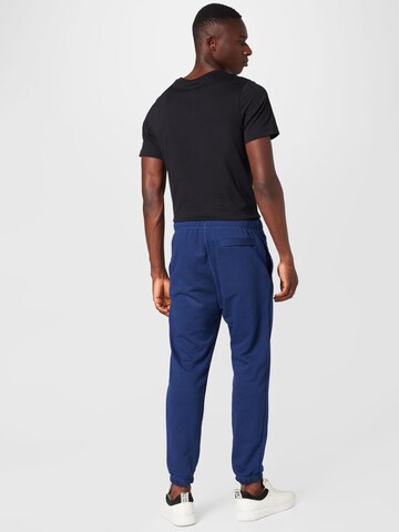 Nike Sportswear Tapered Παντελόνι σε μπλε