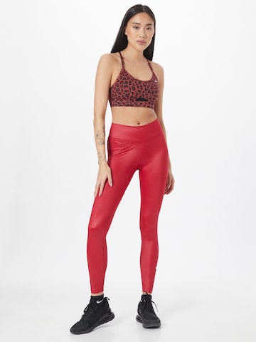 NIKE Skinny Workout Pants in Red