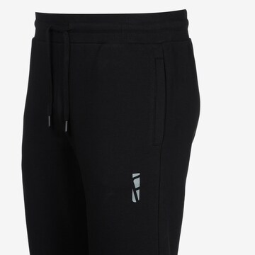 UNIFIT Tapered Workout Pants in Black