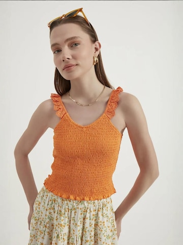 Hiccup Top in Oranje: voorkant