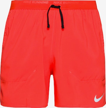NIKE Workout Pants 'Flex Stride' in Red: front