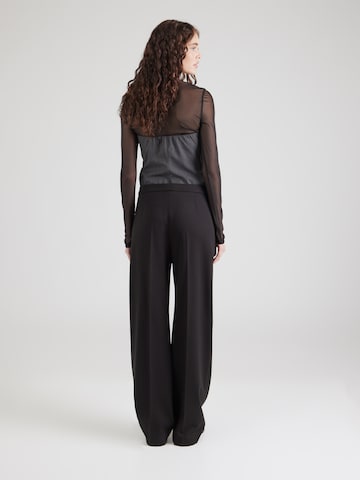 Loosefit Pantaloni con piega frontale 'Tilda1' di BOSS in nero