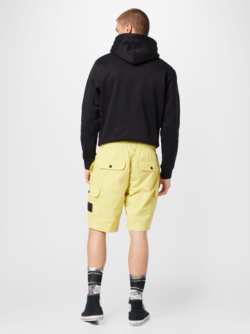 Calvin Klein Jeansregular Cargo hlače - žuta boja