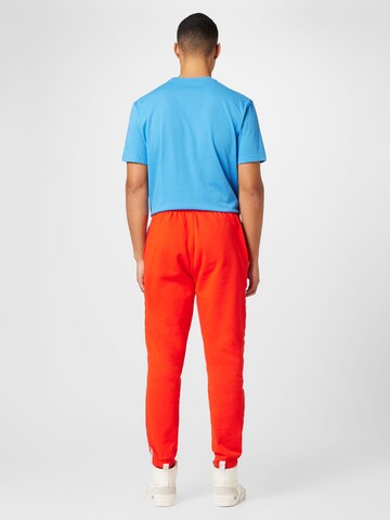 LACOSTE Tapered Hose in Rot