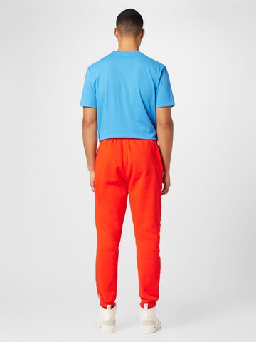 LACOSTE Tapered Pants in Red