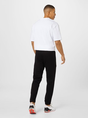 Tapered Pantaloni di Pegador in nero