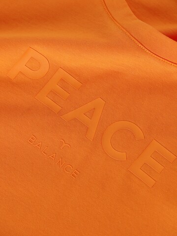 TATUUM Тениска 'TILDA' в оранжево