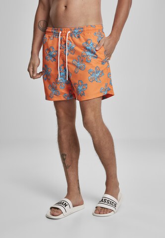 Shorts de bain Urban Classics en orange : devant