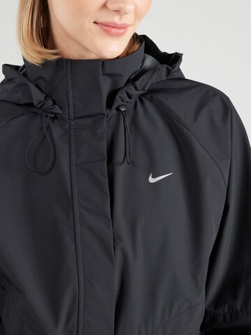 NIKE Sportdzseki 'SWIFT' - fekete