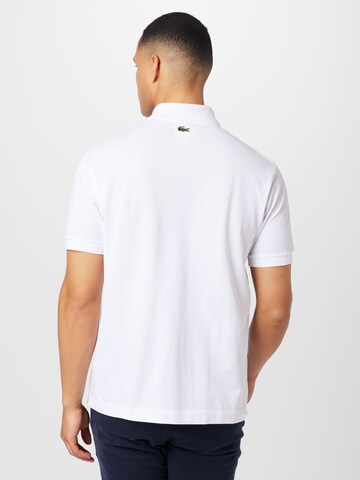 T-Shirt 'Netflix' LACOSTE en blanc