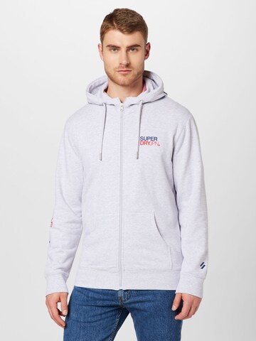 Veste de survêtement Superdry en gris : devant