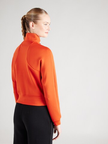 Giacca di felpa sportiva di NIKE in arancione