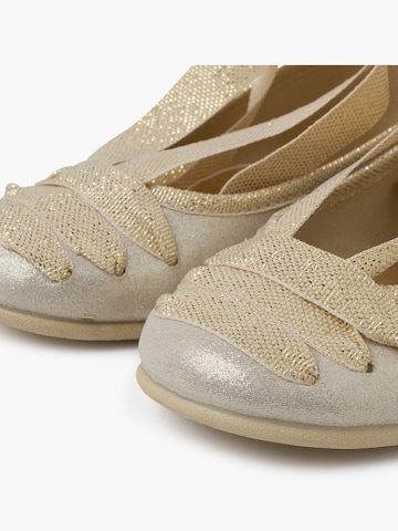 Ballerina di Pisamonas in oro