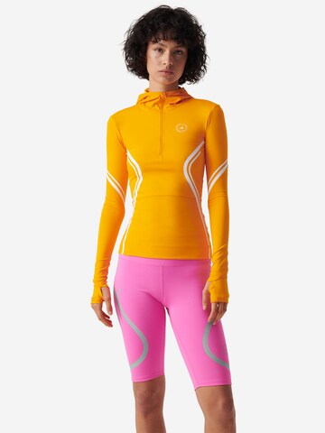 ADIDAS BY STELLA MCCARTNEY Toiminnallinen paita 'Truepace Long' värissä oranssi: edessä