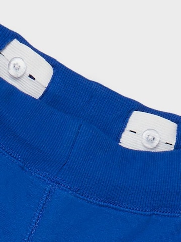 NAME IT Zwężany krój Spodnie w kolorze niebieski