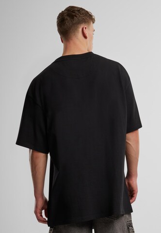 Karl Kani T-Shirt in Schwarz