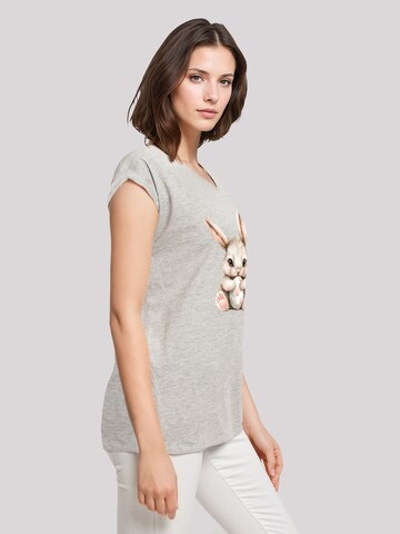 T-shirt 'Niedlicher Osterhase mit Ei' F4NT4STIC en gris