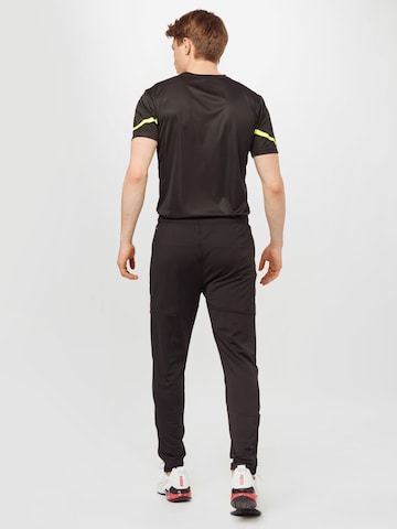 PUMA Slimfit Sportbroek in Zwart