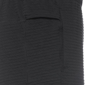 NIKE Regular Sports trousers in Black