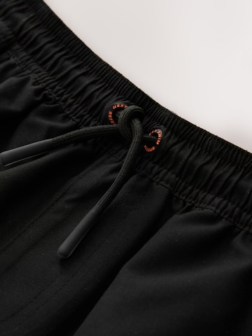 Next Plavecké šortky – černá