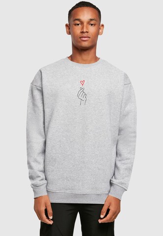 Merchcode Sweatshirt 'K Heart' in Grau: Vorderseite
