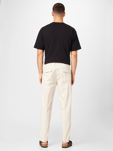 Calvin Klein Štandardný strih Plisované nohavice - Béžová