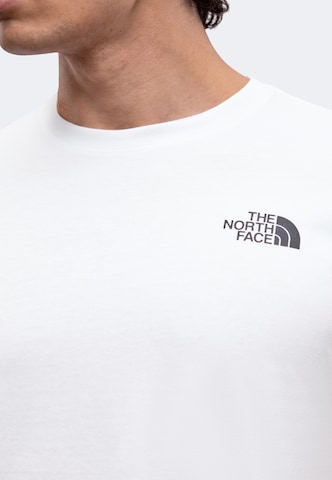 THE NORTH FACE - Camiseta 'TESTED AND PROVEN' en blanco