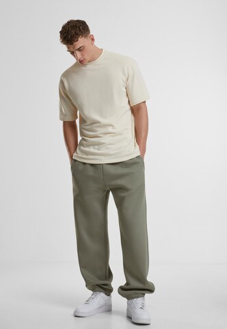 Tapered Pantaloni di Urban Classics in verde