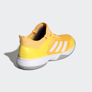 Chaussure de sport 'Ubersonic 4' ADIDAS PERFORMANCE en jaune