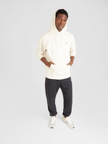 new balance - Sweatshirt 'Essentials' em bege