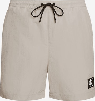 Calvin Klein Swimwear Board Shorts in Beige: front