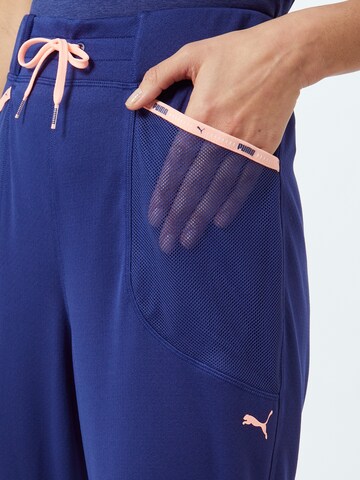 PUMA Zwężany krój Spodnie sportowe w kolorze niebieski
