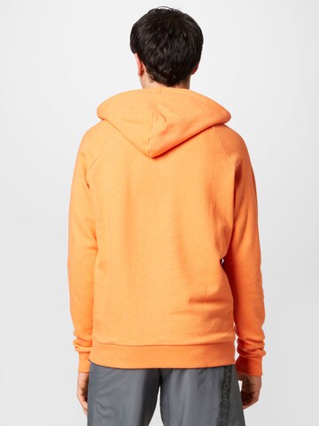 UNDER ARMOUR - Sweatshirt de desporto em laranja