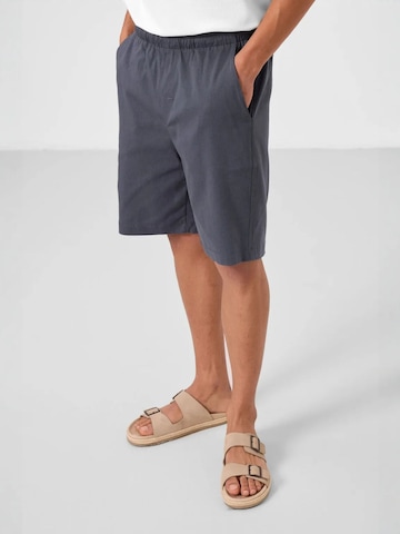 Regular Pantalon chino Tommy Life en gris