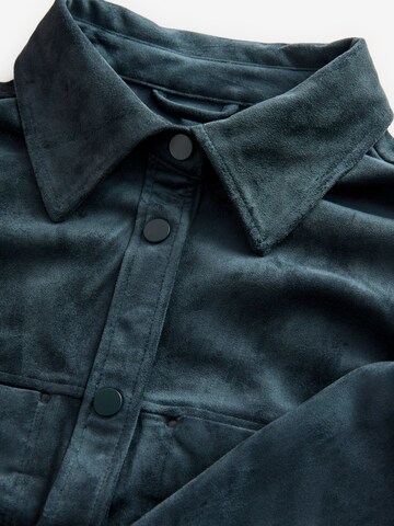 Next Tussenjas in Blauw