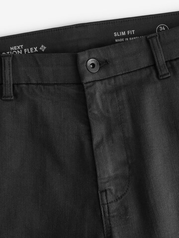 Slimfit Pantaloni chino di Next in nero