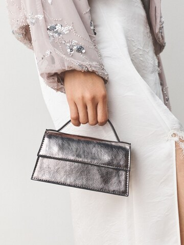 Borsa a mano di Next in bronzo