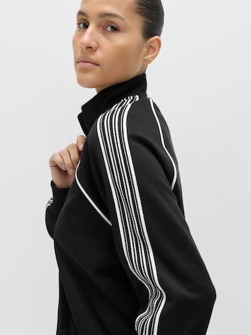Marks & Spencer Trainingsjacke in Schwarz