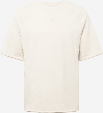 Karl Kani - Camiseta en beige: frente