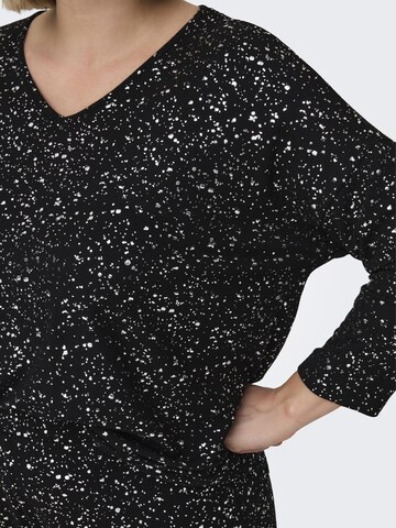 ONLY Carmakoma - Camiseta 'NEW FOILA' en negro