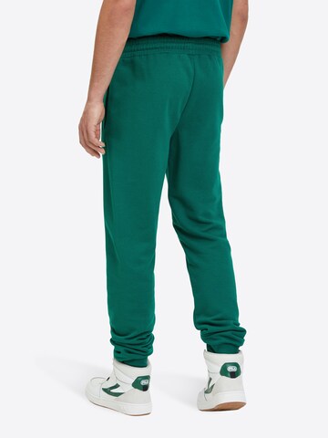 Tapered Pantaloni 'Apparel Braives' de la FILA pe verde
