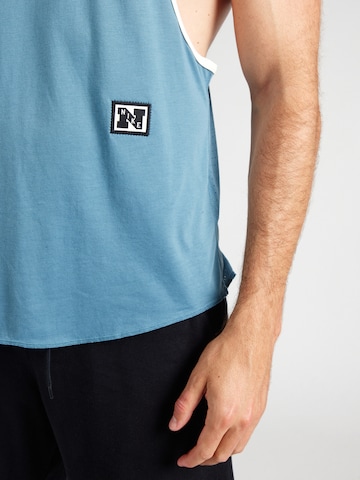 NIKE - Camiseta funcional 'HERITAGE' en azul