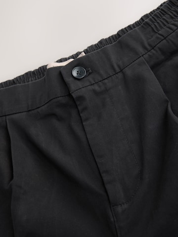 Next Tapered Chino trousers in Black
