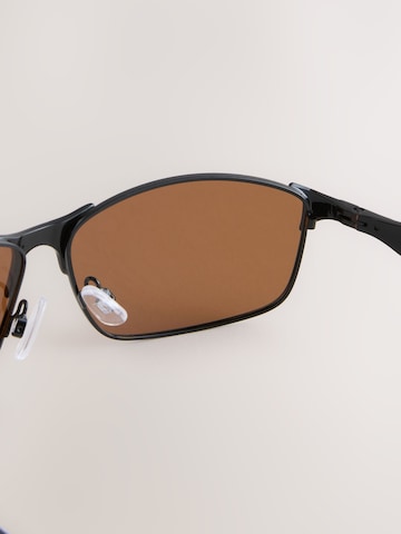 Lunettes de soleil Next en noir