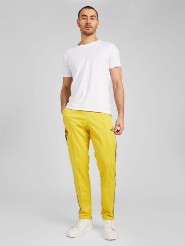 ADIDAS PERFORMANCE Regular Workout Pants in Yellow