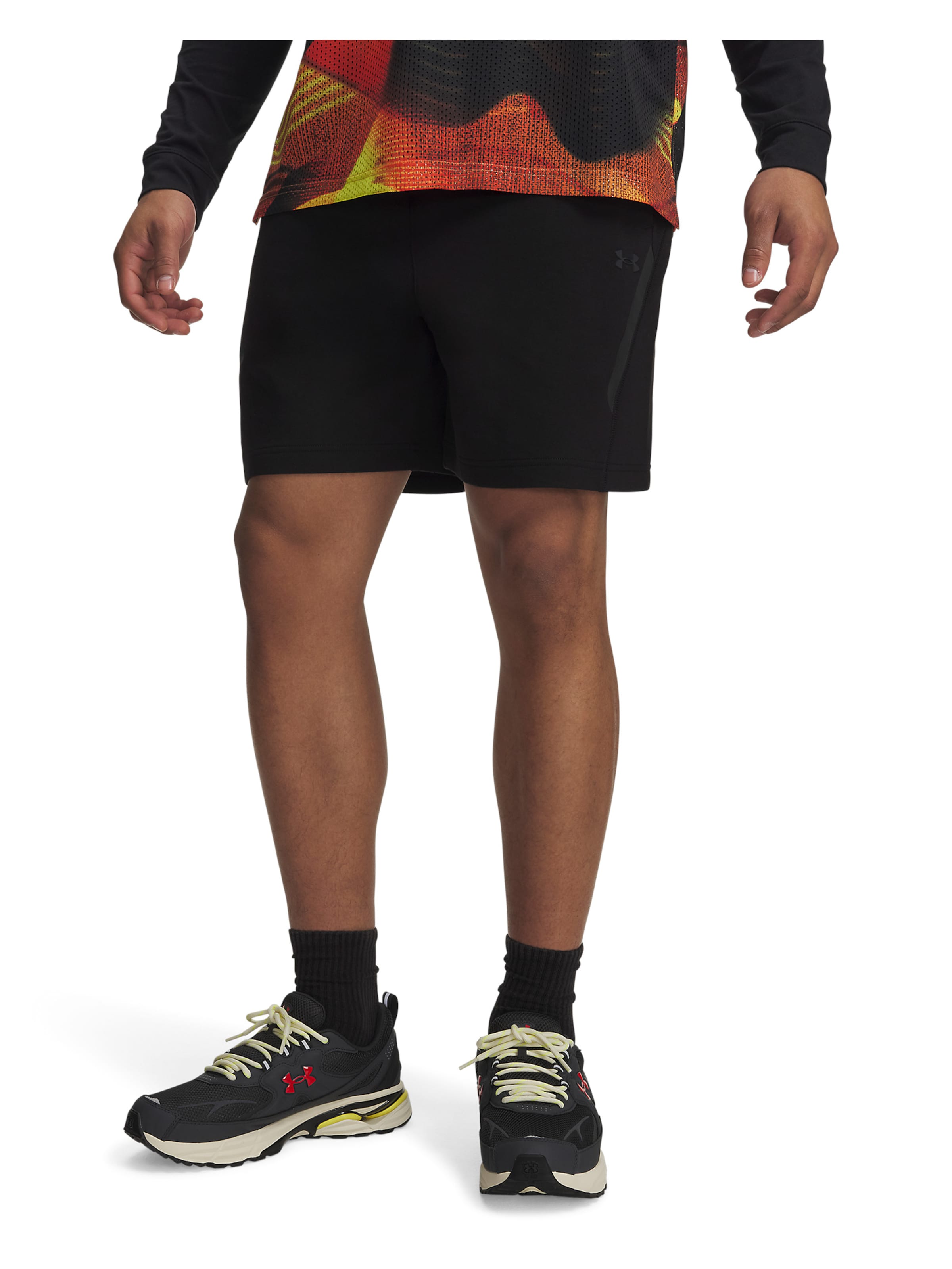 UNDER ARMOUR Regular Sportbroek 'Unstoppable Flc' in Zwart: voorkant