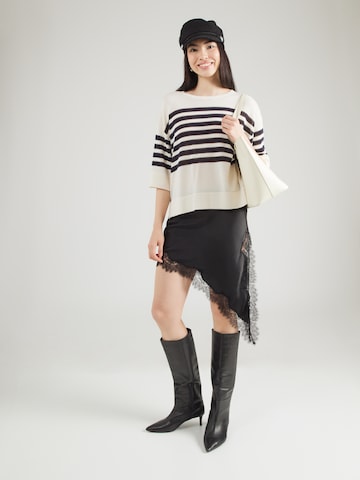 Pulover de la COMMA pe bej