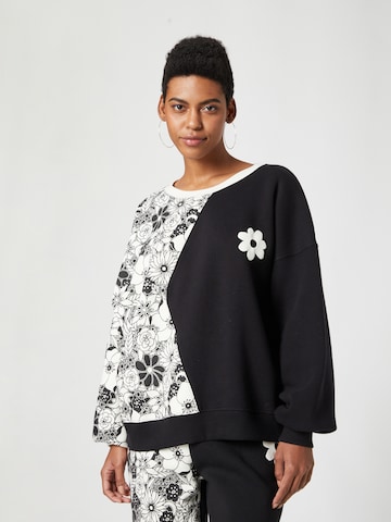 florence by mills exclusive for ABOUT YOU Sweatshirt 'June' i svart: framsida