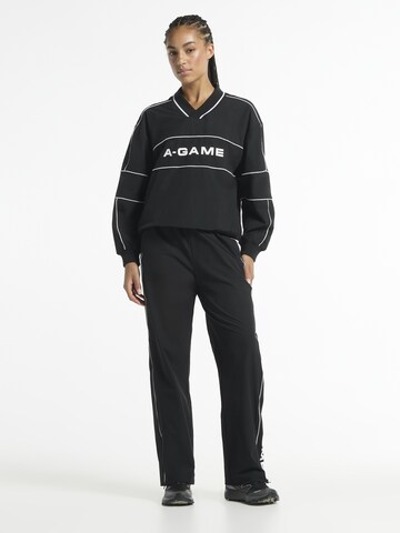 A-Game Sporditopp 'Lifewear', värv must