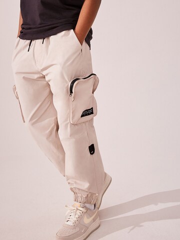 Next Tapered Broek in Beige